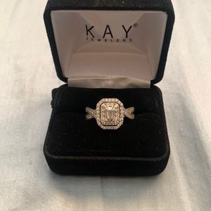 14WG wedding ring size 7.5 but can be resized at Kay jewelry paid 2,161.39